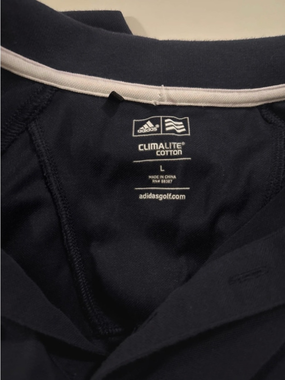 Adidas Men’s Navy Polo Golf shirt made from climalite cotton